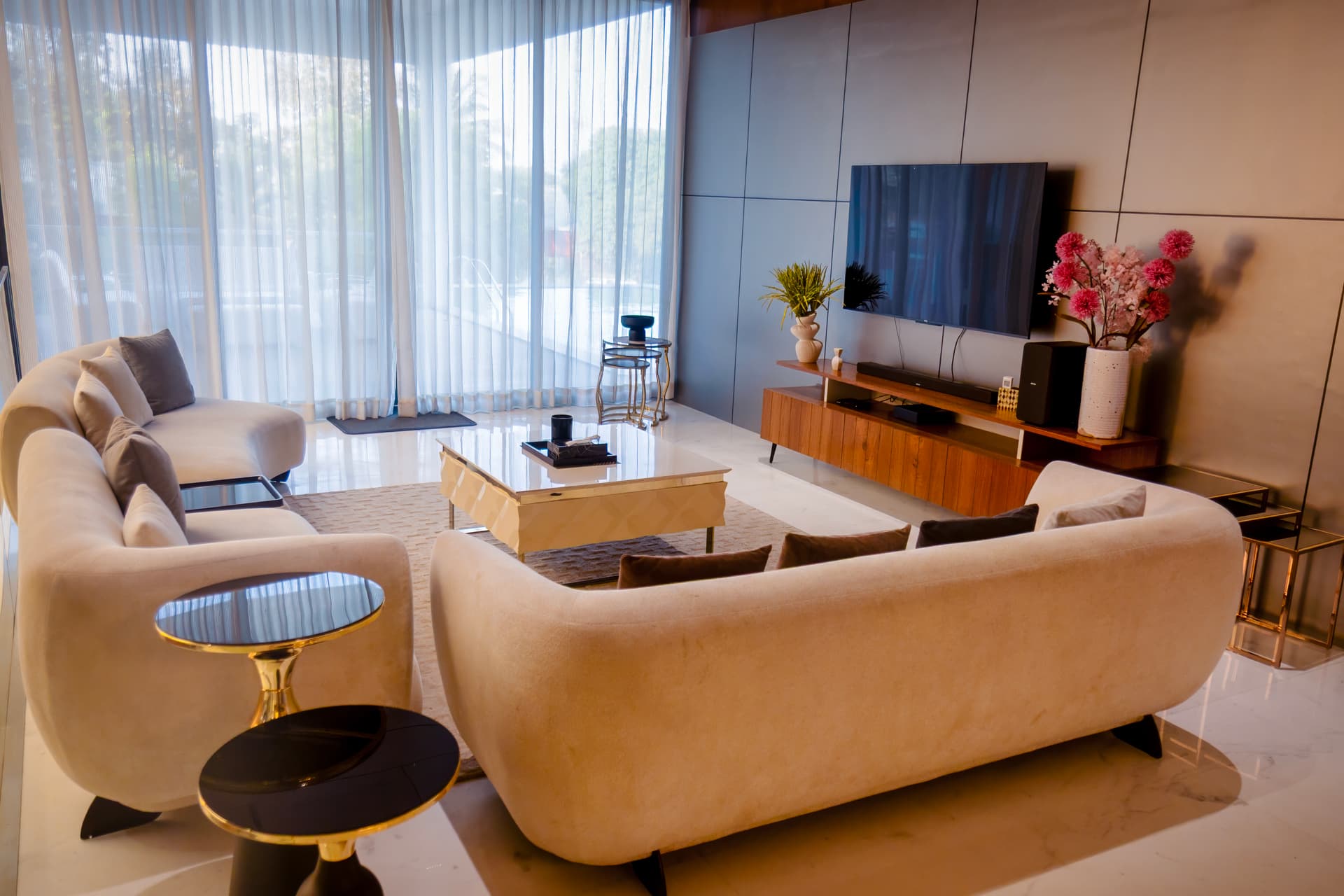 A family playing on the lawn of a farmhouse for a family reunion in Bangalore.